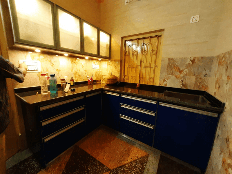 L shaped modular kitchen made by Asia Fineline